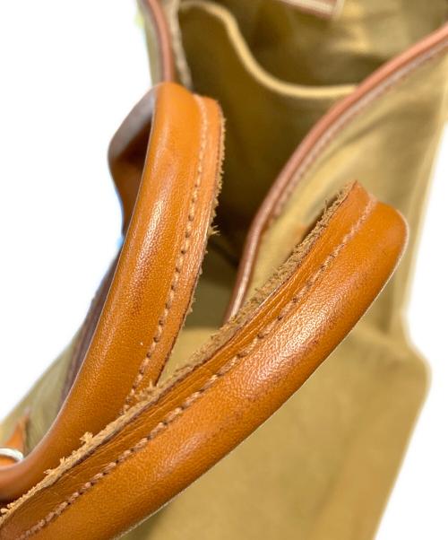 QUALITY GUNSLIPS（クオリティーガンスリップス）QUALITY GUNSLIPS (クオリティーガンスリップス) キャンバスレザートートバッグ ベージュ サイズ:-の古着・服飾アイテム