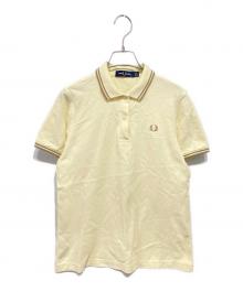 FRED PERRY（フレッドペリー）の古着「The Fred Perry Shirt」｜イエロー