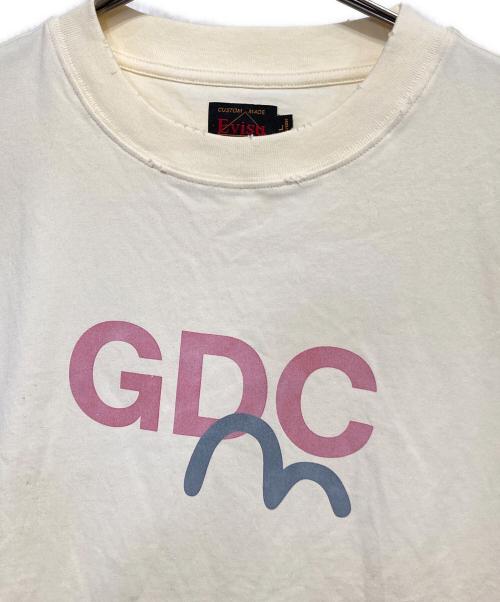 EVISU（エヴィス）EVISU (エヴィス) GDC (ジーディーシー) DIRTY WASHED LOGO TEE ベージュ サイズ:Lの古着・服飾アイテム
