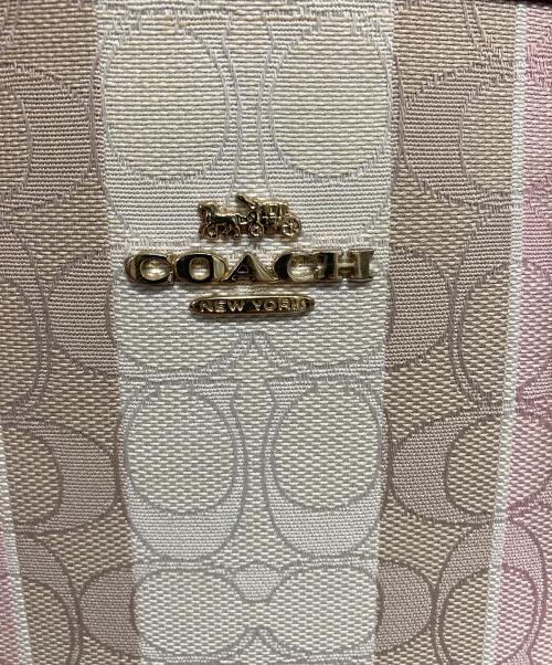COACH（コーチ）COACH (コーチ) モリー トート バッグ 25・シグネチャー キャンバス ピンク×アイボリー サイズ:-の古着・服飾アイテム