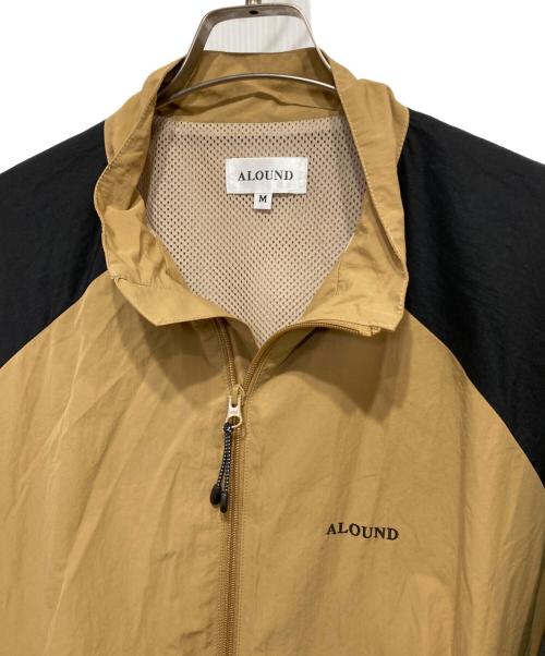 ALOUND（アラウンド）ALOUND (アラウンド) WIDE NYLON TRACK JACKET ベージュ×ブラック サイズ:Mの古着・服飾アイテム