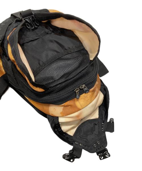 OAKLEY（オークリー）OAKLEY (オークリー) icon mini backpack ブラック×イエローの古着・服飾アイテム
