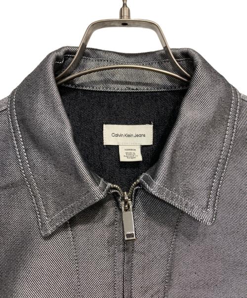 Calvin Klein Jeans（カルバンクラインジーンズ）Calvin Klein Jeans (カルバンクラインジーンズ) Shine Denim Bomber Jacket シルバー サイズ:XSの古着・服飾アイテム