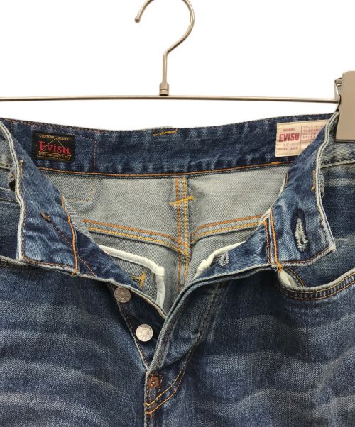 EVISU（エヴィス）EVISU (エビス) グラフィックダイコックデニムパンツ インディゴ サイズ:29　165/74Aの古着・服飾アイテム