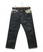 stussyステューシー）の古着「スカルプリントデニムパンツ」｜インディゴ