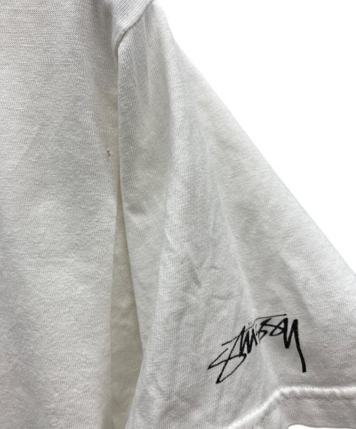 stussy（ステューシー）stussy (ステューシー) アメコミ風Tシャツ ホワイト サイズ:MEDIUMの古着・服飾アイテム