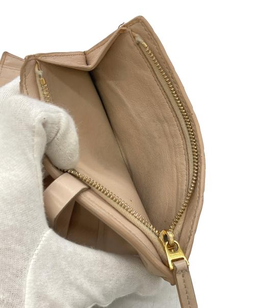 BOTTEGA VENETA（ボッテガベネタ）BOTTEGA VENETA (ボッテガベネタ) ミディアム二つ折りウォレット ベージュの古着・服飾アイテム