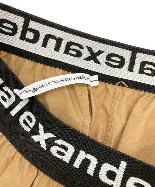 ALEXANDER WANG（アレキサンダー・ワン）ALEXANDER WANG (アレキサンダーワン) ロゴテープパンツ ベージュ サイズ:Sの古着・服飾アイテム