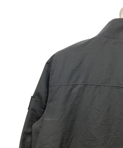 Calvin Klein Jeans（カルバンクラインジーンズ）Calvin Klein Jeans (カルバンクラインジーンズ) ワッペンナイロンジャケット ブラック サイズ:XLの古着・服飾アイテム