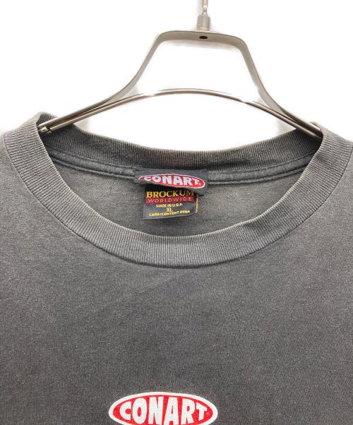 CONART（コナート）CONART (コナート) BROCKUM (ブロッカム) グラフィックプリントTシャツ ブラック サイズ:XLの古着・服飾アイテム