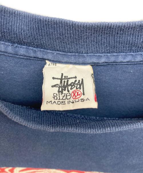 stussy（ステューシー）stussy (ステューシー) ハイビスカスプリントTシャツ ネイビー サイズ:XLの古着・服飾アイテム
