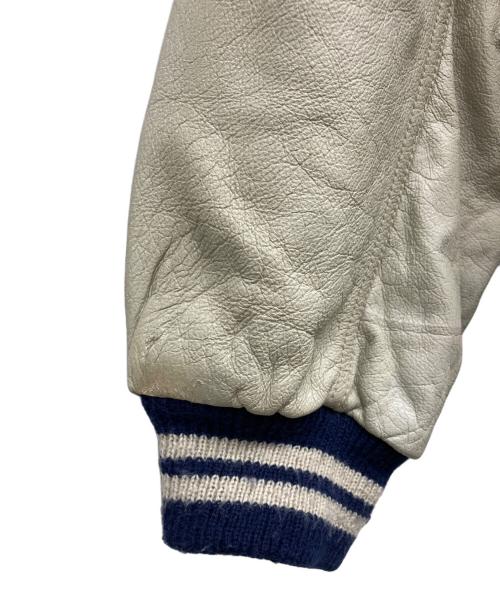 Suntory original design（サントリーオリジナルデザイン）suntory original design (サントリーオリジナルデザイン) スタジャン ネイビー サイズ:不明の古着・服飾アイテム