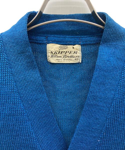 skipper by WILSON BROTHERS（スキッパー バイ ウィルソン ブラザーズ）skipper by WILSON BROTHERS (スキッパー バイ ウィルソン ブラザーズ) レタードカーディガン ブルー サイズ:42の古着・服飾アイテム