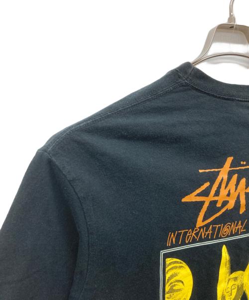 stussy AUSTRALIA（ステューシーオーストラリア）stussy AUSTRALIA (ステューシーオーストラリア) マスクプリントTシャツ ブラック サイズ:Sの古着・服飾アイテム