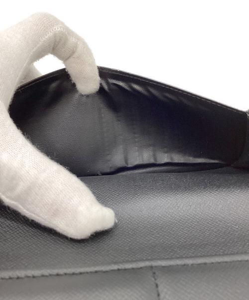 LOUIS VUITTON（ルイ ヴィトン）LOUIS VUITTON (ルイ ヴィトン) ジッピー・ウォレット ヴェルティカル モノグラム  ブラックの古着・服飾アイテム