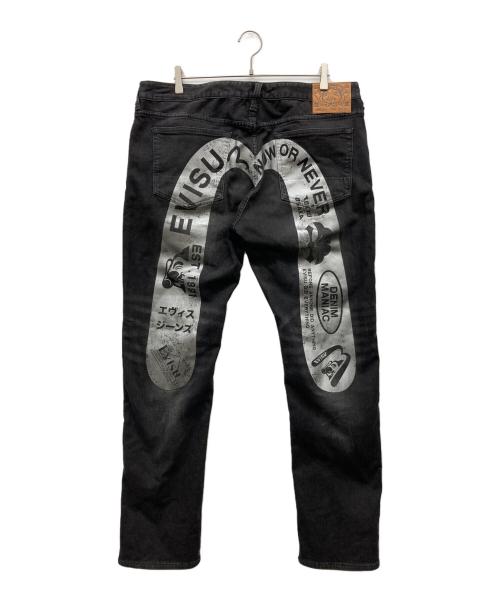 EVISU（エヴィス）EVISU (エヴィス) グラフィティスタイル大黒プリントスリムフィットジーンズ ブラック サイズ:38×34の古着・服飾アイテム