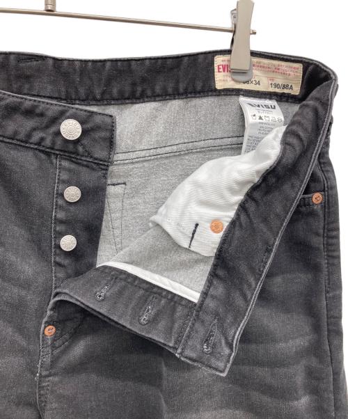 EVISU（エヴィス）EVISU (エヴィス) グラフィティスタイル大黒プリントスリムフィットジーンズ ブラック サイズ:38×34の古着・服飾アイテム