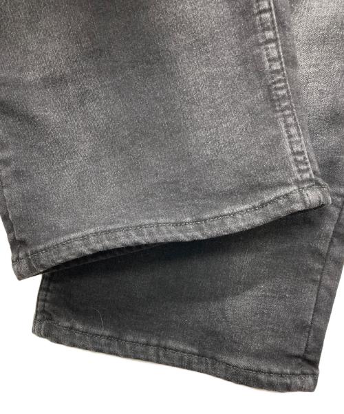 EVISU（エヴィス）EVISU (エヴィス) グラフィティスタイル大黒プリントスリムフィットジーンズ ブラック サイズ:38×34の古着・服飾アイテム