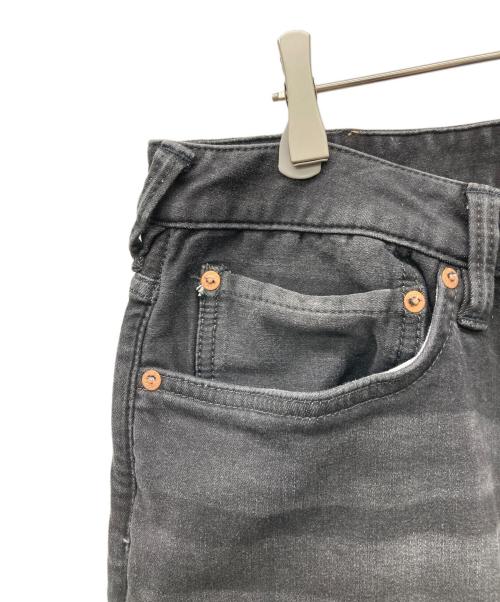 EVISU（エヴィス）EVISU (エヴィス) グラフィティスタイル大黒プリントスリムフィットジーンズ ブラック サイズ:38×34の古着・服飾アイテム