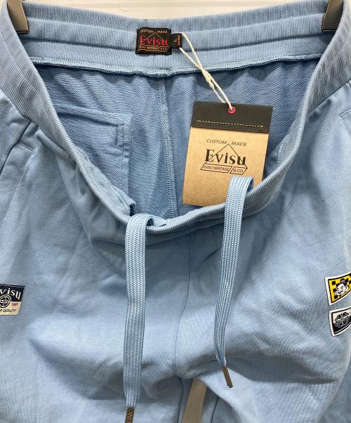 EVISU（エヴィス）EVISU (エヴィス) だるまプリントスウェットパンツ スカイブルー サイズ:Lの古着・服飾アイテム