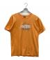 stussy（ステューシー）の古着「プリントTシャツ」｜オレンジ