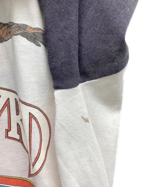 USED（ユーズド）USED (ユーズド) カットオフ ラグランバンドTシャツ Lynyrd Skynyrd ブラック×ホワイト サイズ:XLの古着・服飾アイテム