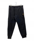 Carhartt WIPカーハート ワークインプログレス）の古着「AMERICAN SCRIPT JOGGING PANT」｜ブラック