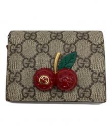 GUCCI（グッチ）の古着「チェリーコンパクトウォレット」｜ベージュ