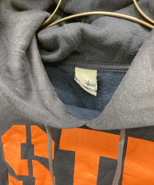 stussy（ステューシー）stussy (ステューシー) 両面プリントパーカー ネイビー サイズ:Lの古着・服飾アイテム