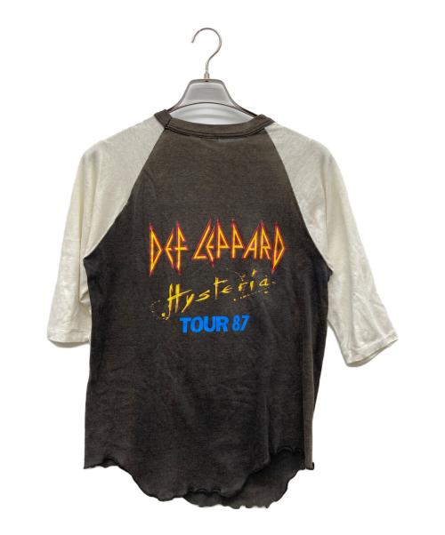 HANDTEX（ハンドテックス）HANDTEX (ハンドテックス) 80sラグランバンドTシャツ DEF LEPPARD HYSTERIA ホワイト×ブラック サイズ:LARGEの古着・服飾アイテム