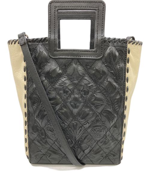 Carving Tribes（カービングトライブス）CARVING TRIBES (カービングトライブス) バイカラー型押しショルダーバッグ ブラックの古着・服飾アイテム