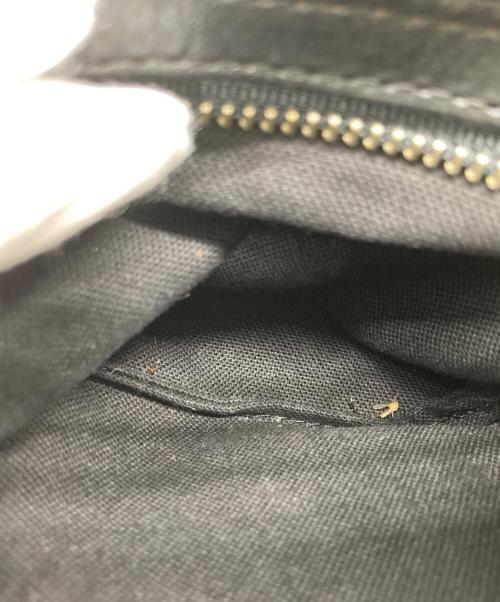 Carving Tribes（カービングトライブス）CARVING TRIBES (カービングトライブス) バイカラー型押しショルダーバッグ ブラックの古着・服飾アイテム