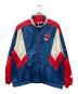 GENUINE MERCHANDISE（ジェニュイン マーチャンダイズ）の古着「インディアンス ナイロンジャケット」｜レッド×ブルー