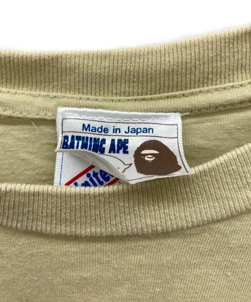 A BATHING APE（アベイシングエイプ）A BATHING APE (アベイシングエイプ) プリントTシャツ ベージュ サイズ:Lの古着・服飾アイテム