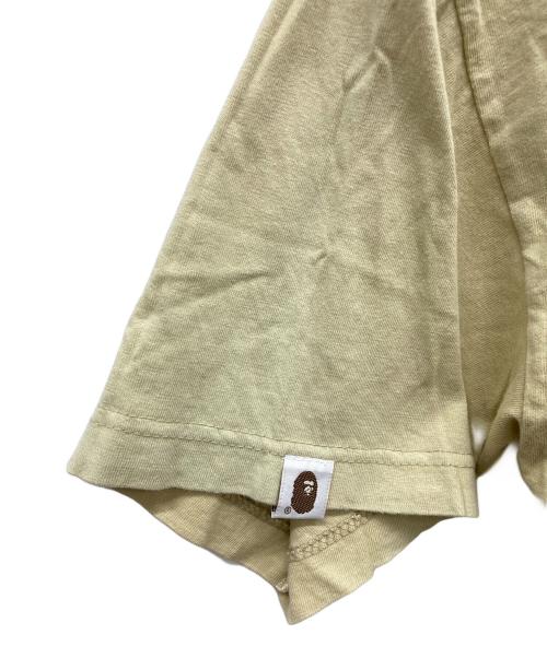A BATHING APE（アベイシングエイプ）A BATHING APE (アベイシングエイプ) プリントTシャツ ベージュ サイズ:Lの古着・服飾アイテム