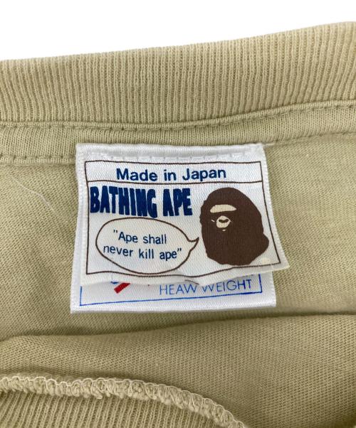 A BATHING APE（アベイシングエイプ）A BATHING APE (アベイシングエイプ) プリントTシャツ ベージュ サイズ:Lの古着・服飾アイテム
