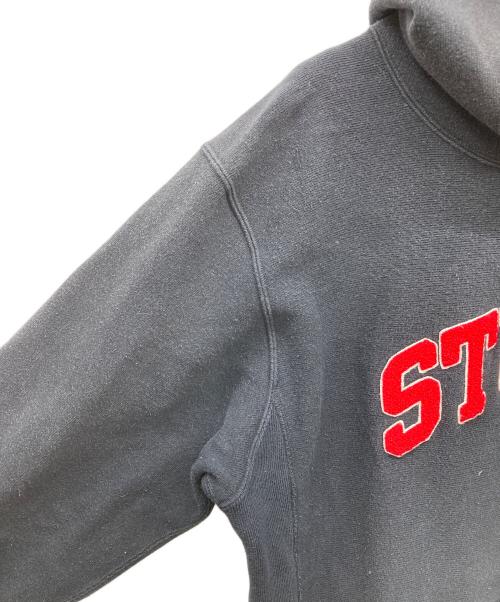 Champion（チャンピオン）Champion (チャンピオン) stussy (ステューシー) プルオーバーパーカー ブラック サイズ:X-LARGEの古着・服飾アイテム
