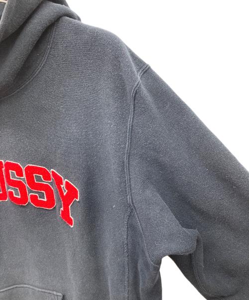 Champion（チャンピオン）Champion (チャンピオン) stussy (ステューシー) プルオーバーパーカー ブラック サイズ:X-LARGEの古着・服飾アイテム