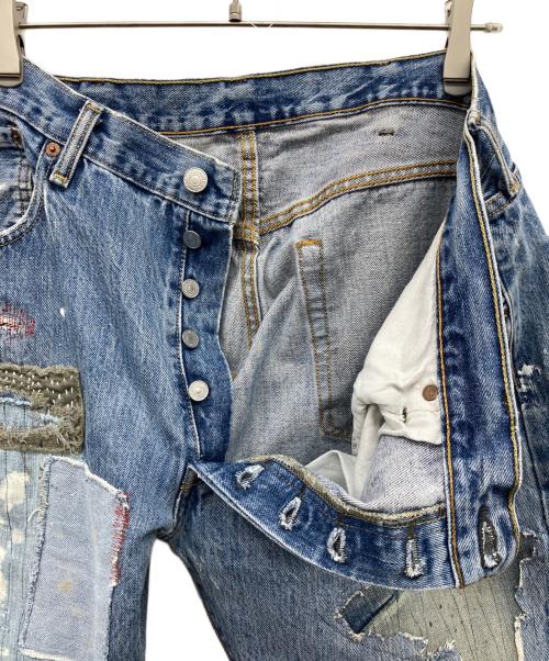 LEVI'S（リーバイス）LEVI'S (リーバイス) パッチワークデニムパンツ インディゴ サイズ:38×29の古着・服飾アイテム