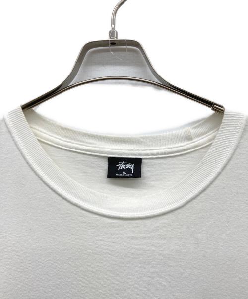 stussy（ステューシー）stussy (ステューシー) モアイプリント長袖カットソー ホワイト サイズ:XLの古着・服飾アイテム