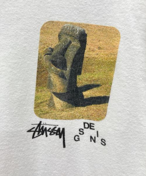 stussy（ステューシー）stussy (ステューシー) モアイプリント長袖カットソー ホワイト サイズ:XLの古着・服飾アイテム