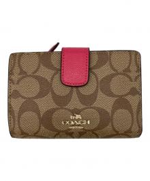 COACH（コーチ）の古着「シグネチャー2つ折り財布」｜ベージュ