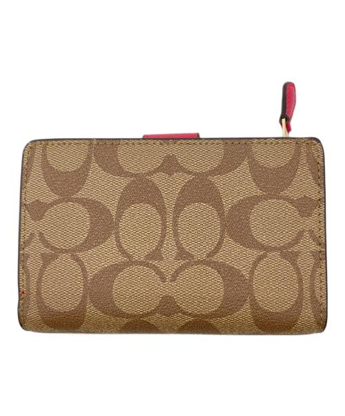 COACH（コーチ）COACH (コーチ) シグネチャー2つ折り財布 ベージュの古着・服飾アイテム