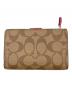 COACH (コーチ) シグネチャー2つ折り財布 ベージュ：5000円