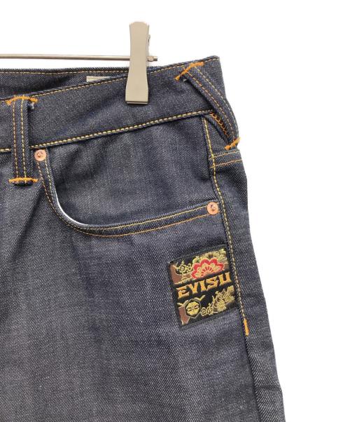 EVISU（エヴィス）EVISU (エヴィス) ハンドブラシ大黒プリントと波刺繍 リラックスフィット ジーンズ インディゴ サイズ:34 185/84Aの古着・服飾アイテム