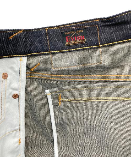 EVISU（エヴィス）EVISU (エヴィス) ハンドブラシ大黒プリントと波刺繍 リラックスフィット ジーンズ インディゴ サイズ:34 185/84Aの古着・服飾アイテム