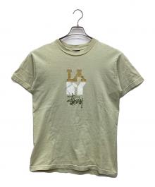 stussy（ステューシー）の古着「プリントTシャツ」｜黄緑