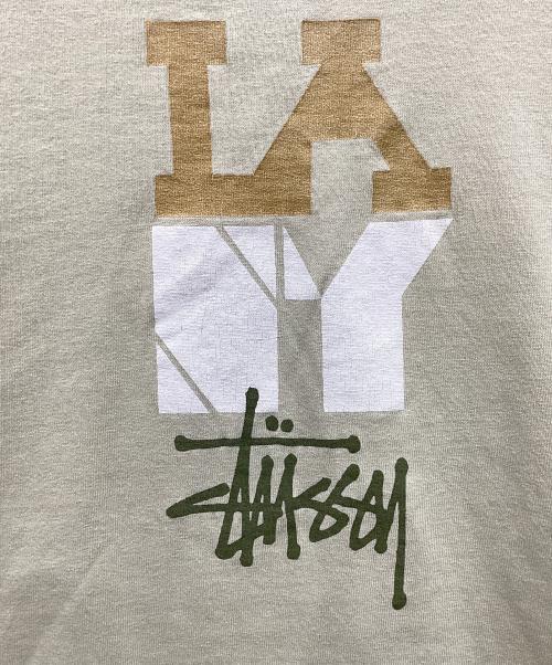 stussy（ステューシー）stussy (ステューシー) プリントTシャツ 黄緑 サイズ:Mの古着・服飾アイテム
