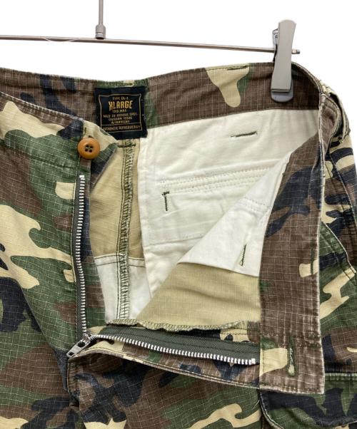 X-LARGE（エクストララージ）X-LARGE (エクストララージ) カモ柄パラシュートパンツ グリーン サイズ:32の古着・服飾アイテム