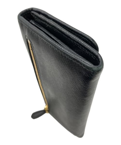 PRADA（プラダ）PRADA (プラダ) リボン長財布 SAFFIANO FIOCCO ブラックの古着・服飾アイテム